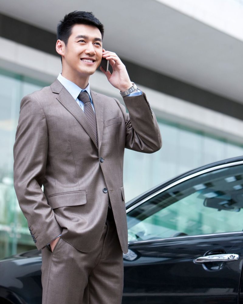 young-businessman-on-the-phone-PF6QW7H.jpg